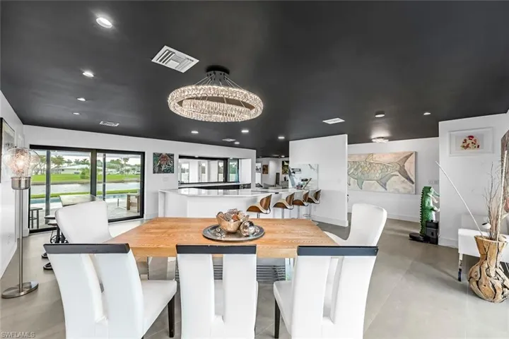 Dining area with a chandelier