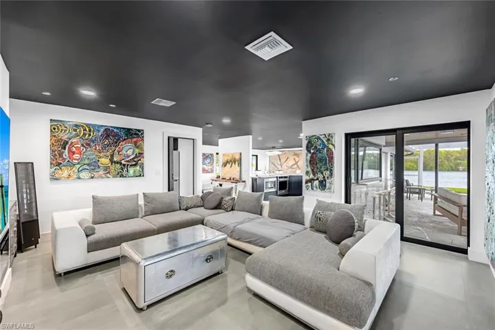 Living room featuring a water view