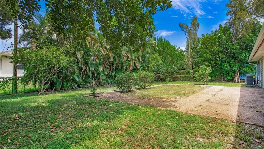 View of fenced-in backyard.