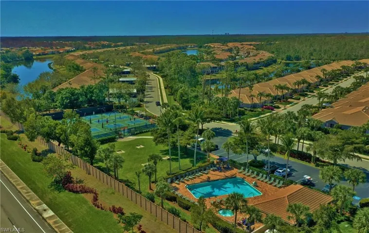 Bird's eye view of a large body of water and a pool area