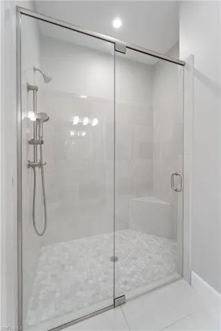 Bathroom featuring a shower with shower door
