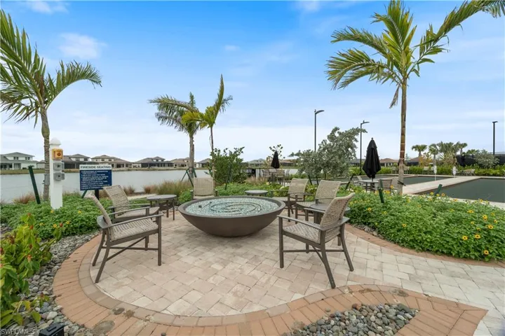 View of patio featuring an outdoor fire pit