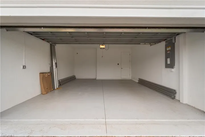 Garage featuring electric panel