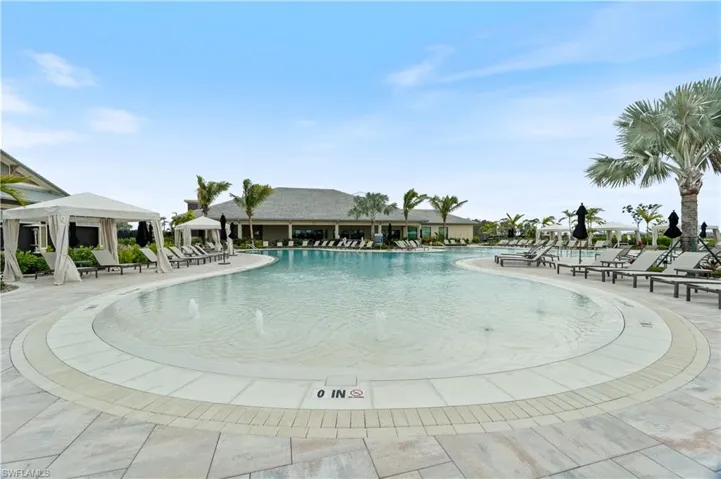 View of pool with a gazebo, pool water feature, and a patio