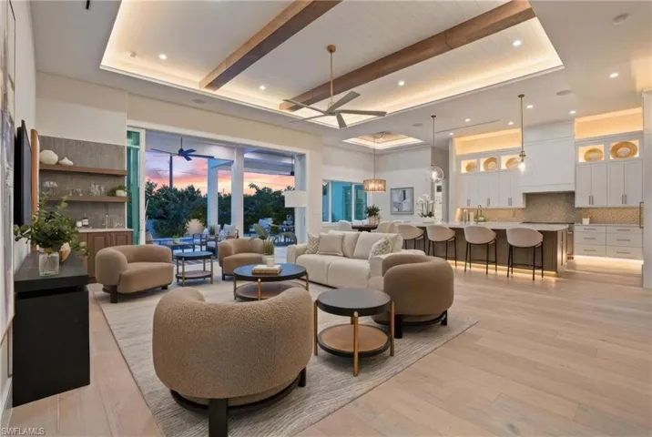 Community lobby with recessed lighting and a tray ceiling