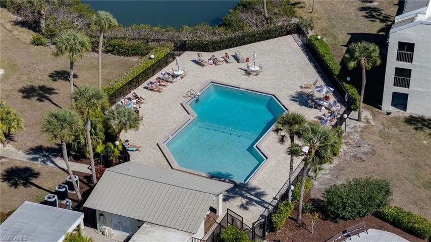 Aerial view of a large body of water and a pool area