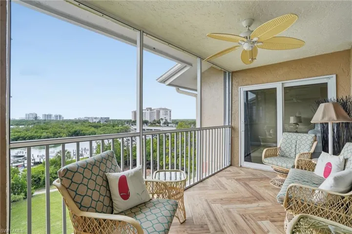 Lanai with porcelain woodgrain herringbone tile