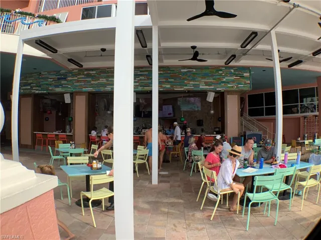 Bar at pool area and pool restaurant