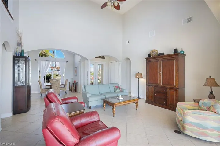 Great room toward entry and formal dining room