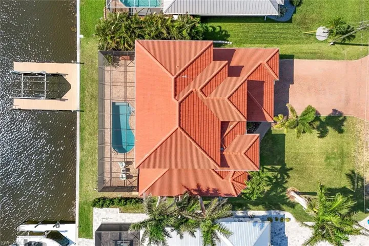 Areial view of the property with new tile roof in 2022