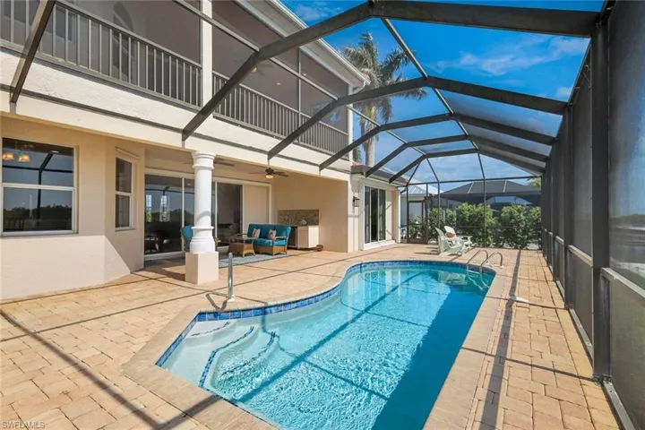 Sparkling, screened pool, lanai, outdoor kitchen and screened 2nd level balcony