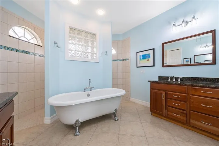 Primary bathroom with dual vanities