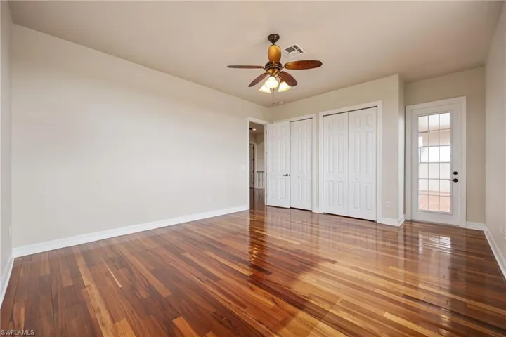 3rd bedroom upstairs with door to balcony