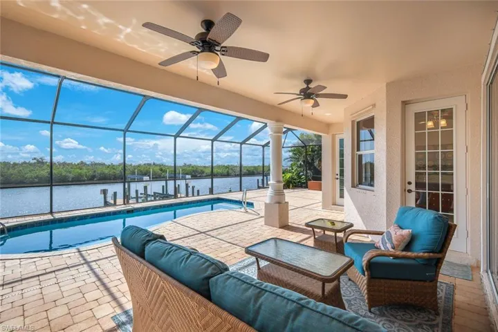 Relax in the shade, in the sparkling pool or in the sunshine in the overside lanai area or by the water on the dock