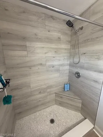 Master bathroom with tiled shower