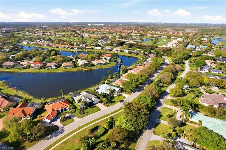 Aerial view of residential area with a large body of water