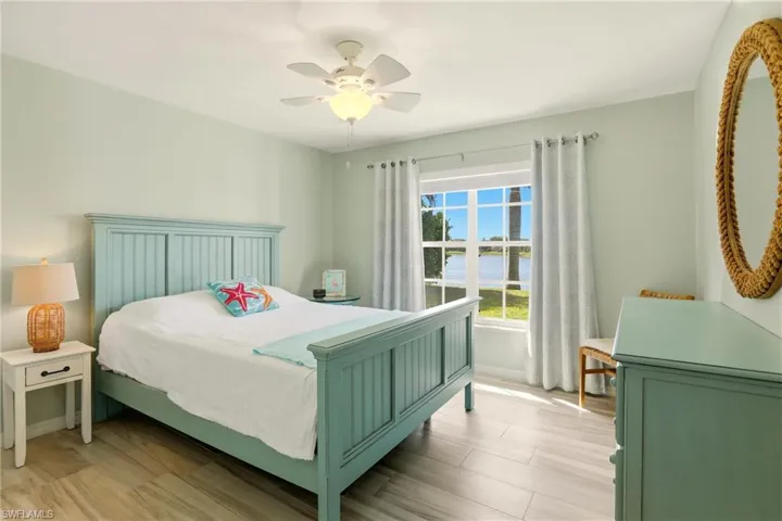 Bedroom featuring a ceiling fan and light wood finished floors