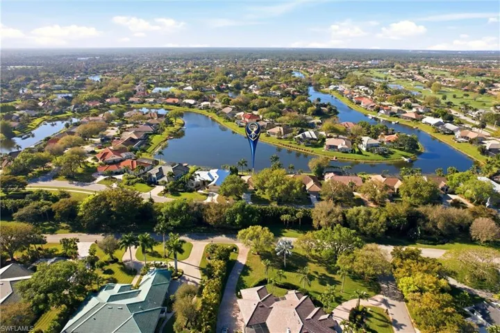 View of property location featuring nearby suburban area and a large body of water