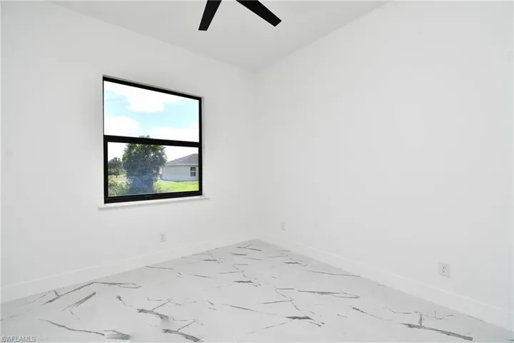 Interior space with a modern aesthetic featuring large-format porcelain tile flooring