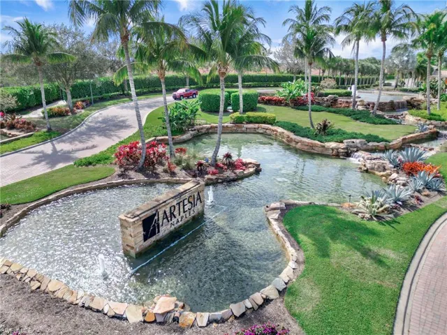 View of property's community with a water feature