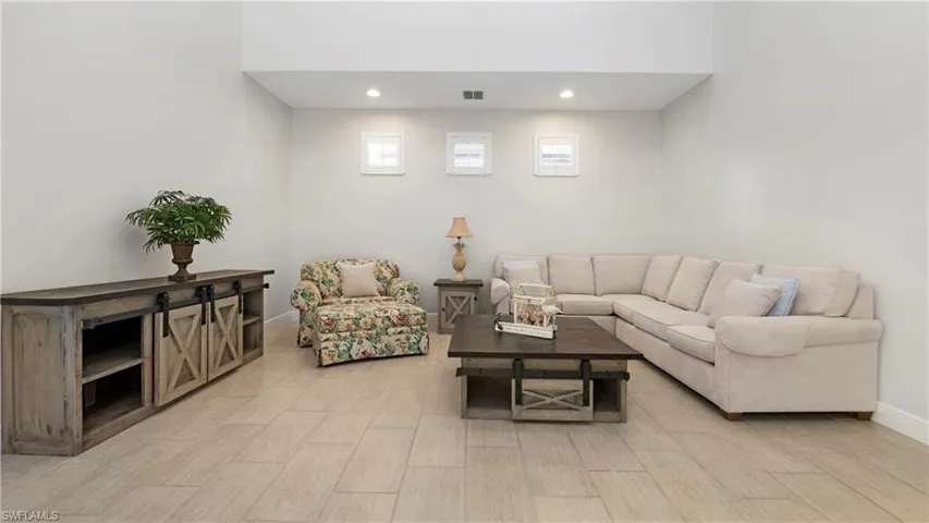 Living area featuring recessed lighting and wood finish floors