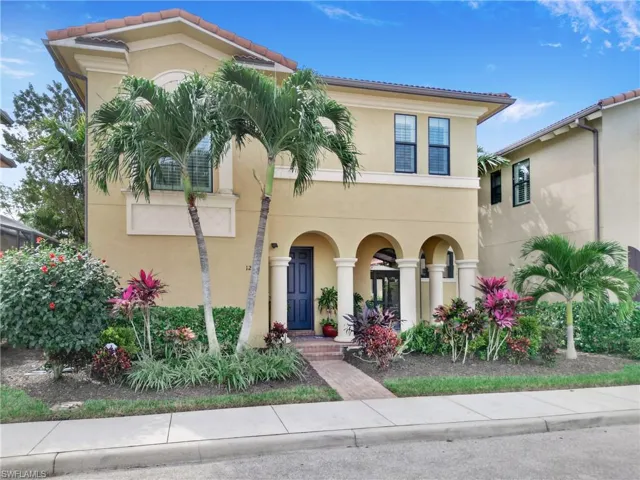 Mediterranean / spanish house featuring stucco siding and covered porch