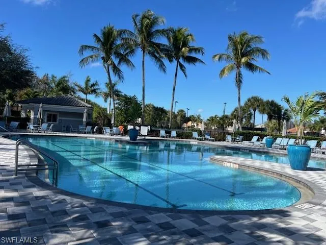Community pool wth hot tub and snack bar.