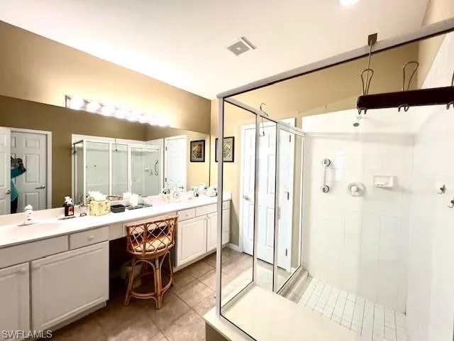 Owners Bathroom - Double Sinks and a walk-In Shower