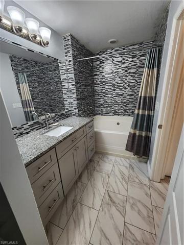 Master bathroom vanity and tub/shower