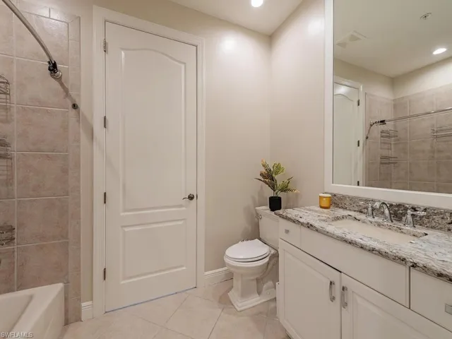 Guest bathroom with  shower / bath combo