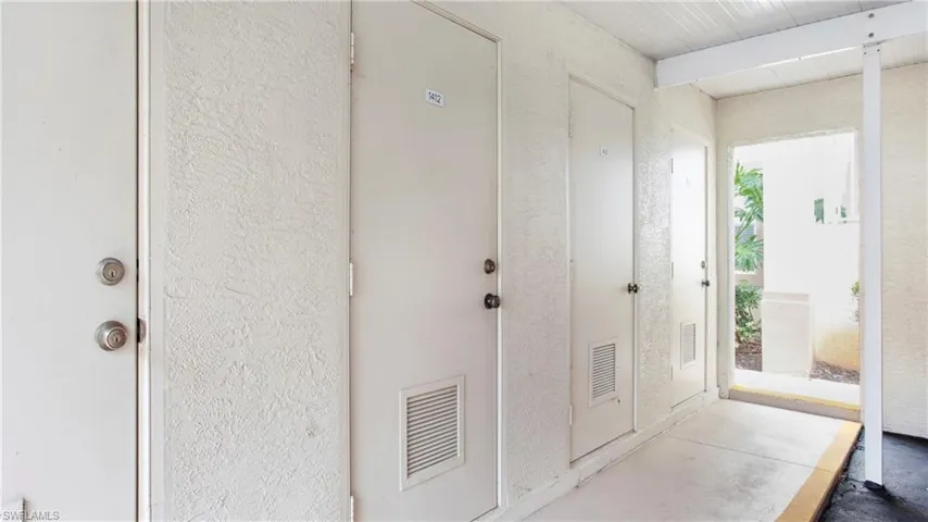 Entrance foyer with concrete floors