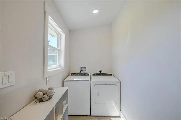 Washroom with separate washer and dryer