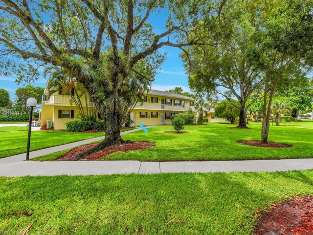 Split foyer home with a front lawn