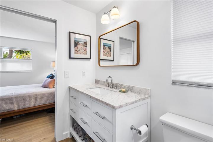 Ensuite 2nd bathroom. Marble countertop on your single sink vanity.