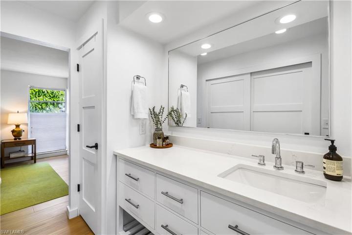 Primasry ensuite bath has lots of storage.