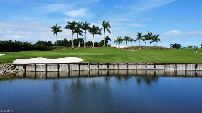 view of 7th green on the Pines golf course, and a water view