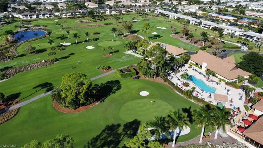 View of clubhouse, main pool and Palmetto golf course.