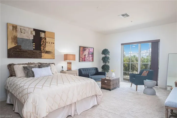 Bedroom featuring carpet floors and access to outside