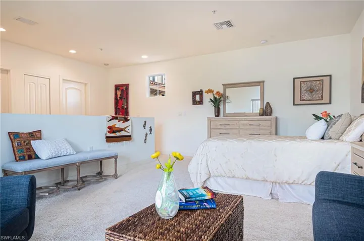 Bedroom with carpet flooring and recessed lighting