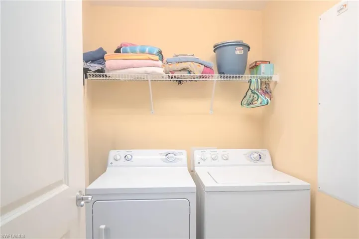 Laundry room with washing machine and dryer
