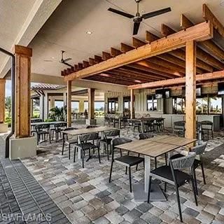 View of patio / terrace featuring ceiling fan and outdoor dining space