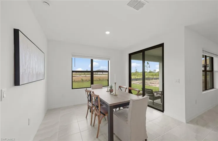 Photos of the actual home with some staged furnishings.