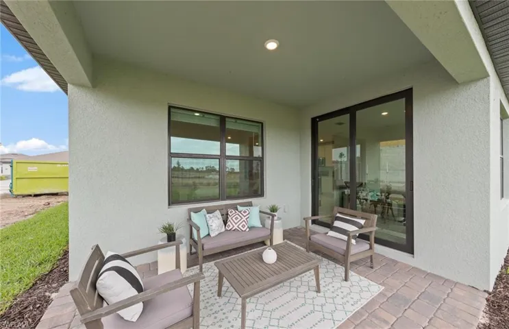 Photos of the actual home with some staged furnishings.