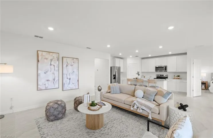 Photos of the actual home with some staged furnishings.