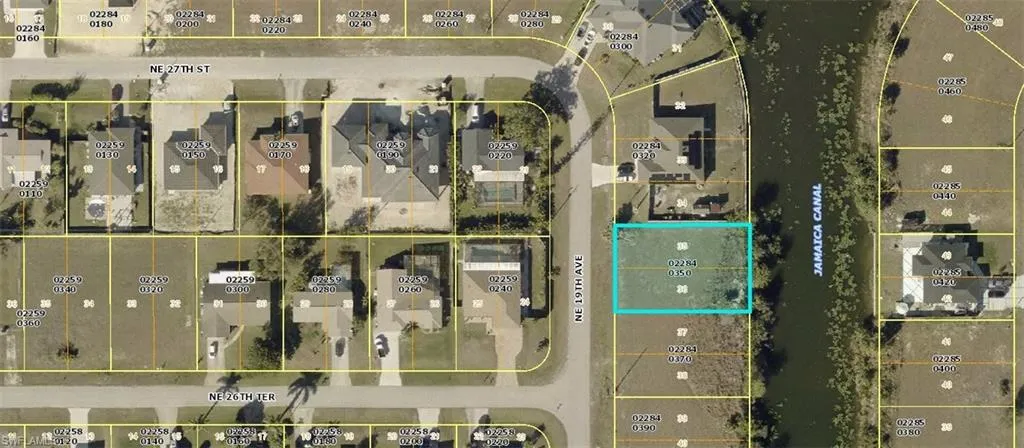 Satellite view of property location featuring property boundaries highlighted