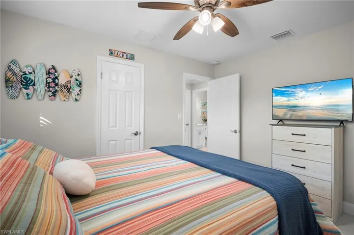 Bedroom featuring a ceiling fan