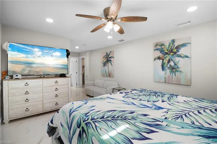 Bedroom featuring a ceiling fan and recessed lighting