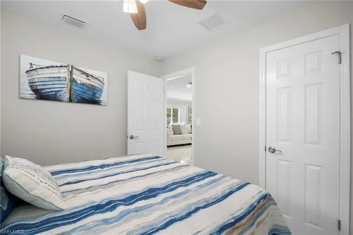 Bedroom featuring ceiling fan