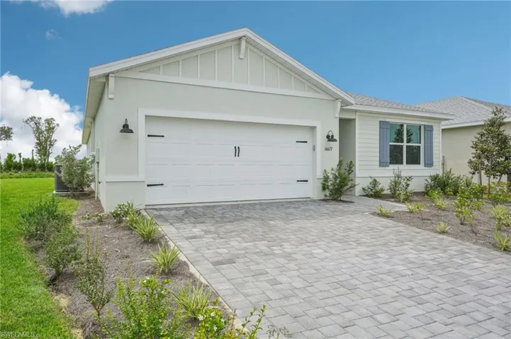 Single story home featuring a garage
