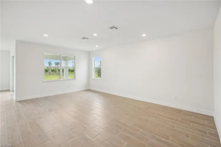 Unfurnished room featuring light hardwood / wood-style flooring